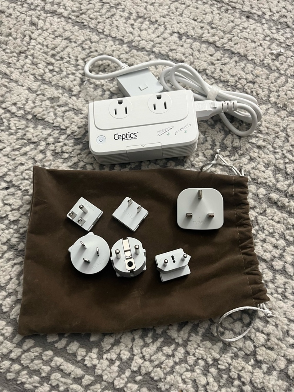 White Travel Power Strip with International Plug Adapters